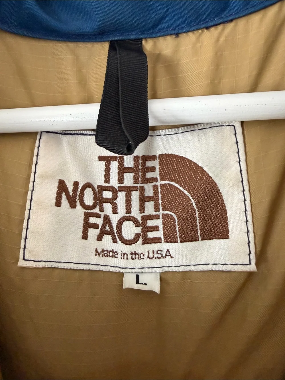 The North Face vintage blue goose down fill snap up puffer vest Men’s sz L